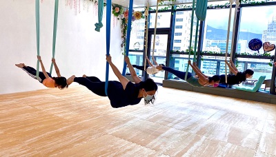 Venee Cheung with aerial yoga at Joneestic Studio